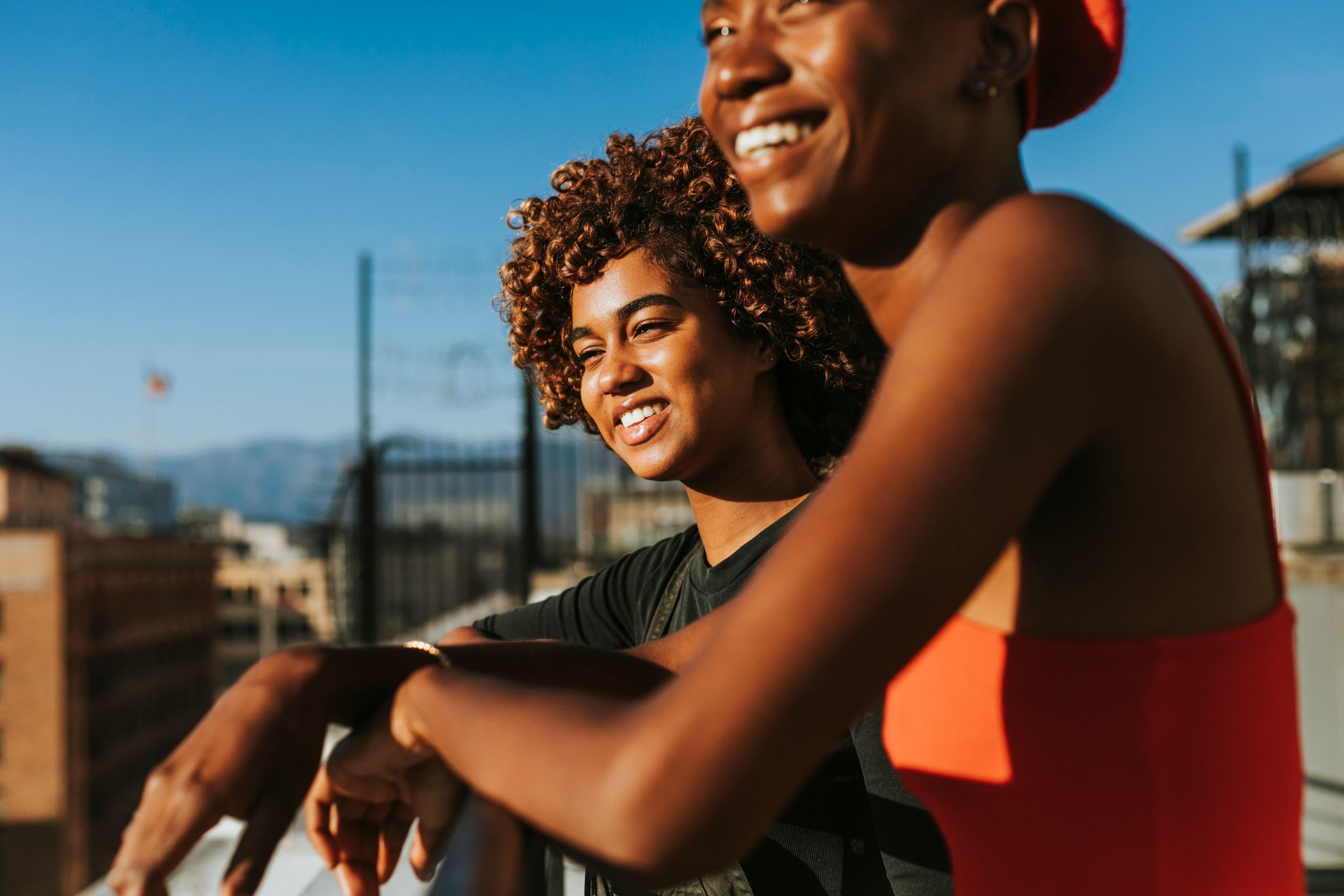 Two Seevcash community members smiling outdoors